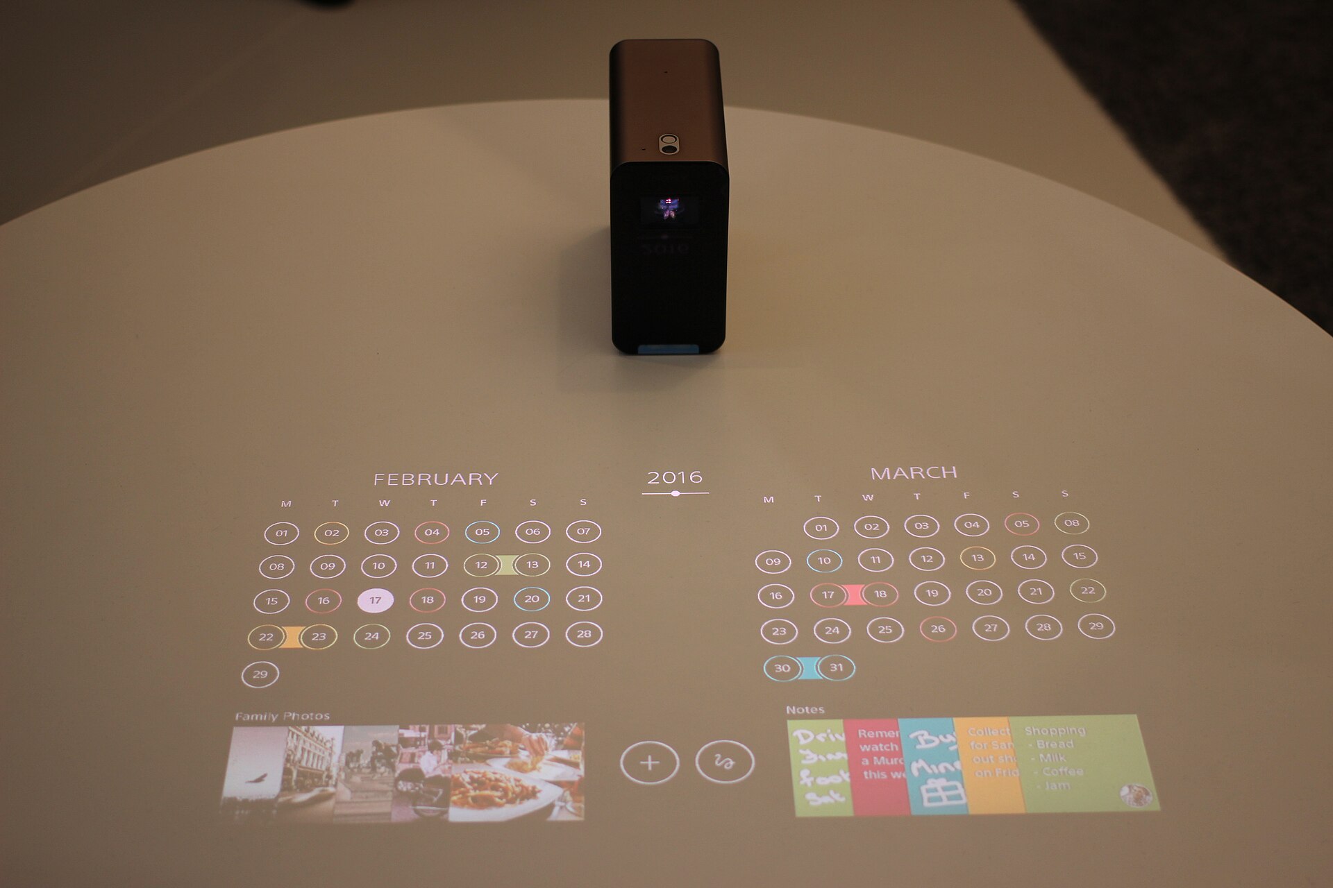 A short-throw projector unit shown close up