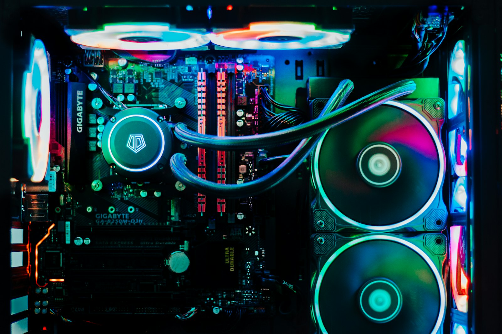 Close-up of a computer motherboard in a dark room